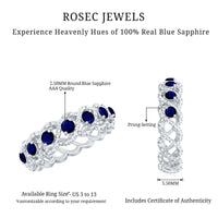 Elegant natural blue sapphire infinity ring by Rosec Jewels, featuring a continuous band with sparkling blue sapphires for anniversaries.