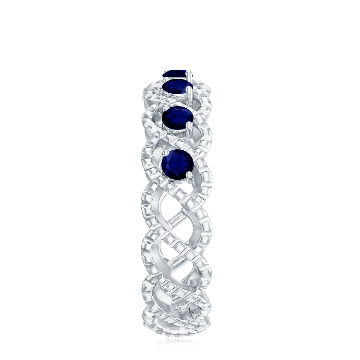 Natural blue sapphire infinity ring by Rosec Jewels featuring a band with blue sapphires and infinity design, suitable for anniversaries.