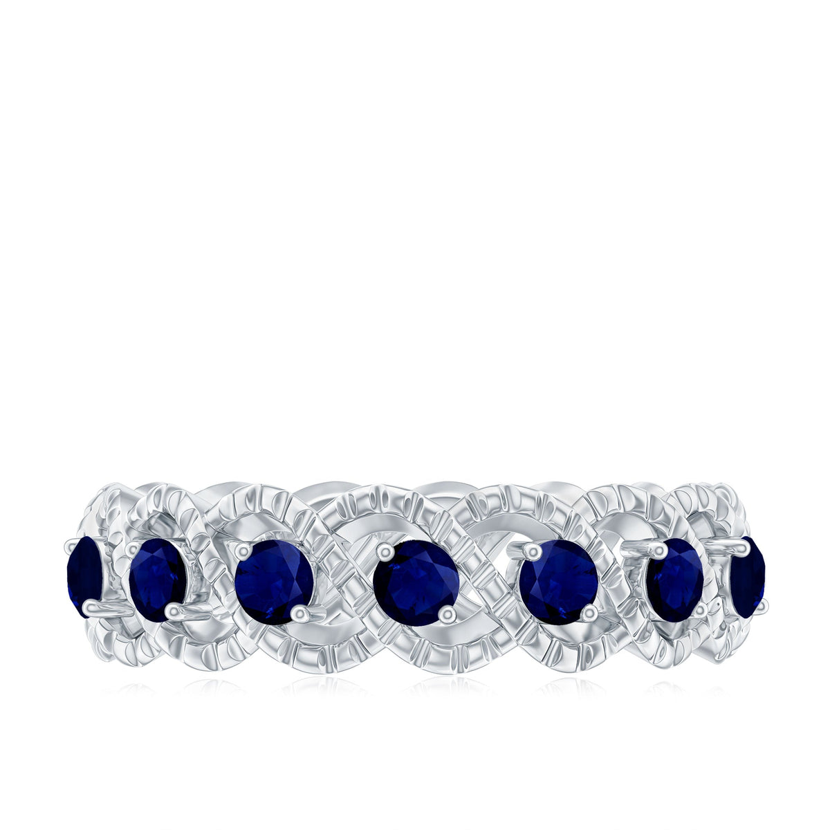 Natural blue sapphire infinity ring for anniversary by Rosec Jewels, showcasing a sparkling blue sapphire gemstone in a sleek band.