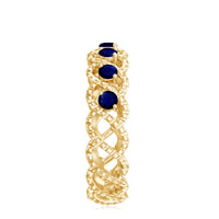 Natural blue sapphire infinity ring by Rosec Jewels, showcasing a shimmering blue sapphire centerpiece on a sleek silver band.
