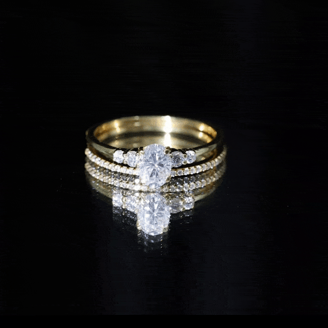 Yellow gold oval lab-grown diamond wedding ring set by Rosec Jewels, featuring a 0.75 carat center stone and matching bands.
