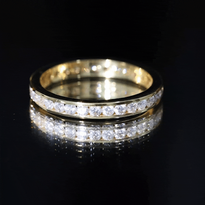 Yellow gold eternity ring with channel-set lab-grown diamonds by Rosec Jewels, showcasing a continuous row of sparkling diamonds.