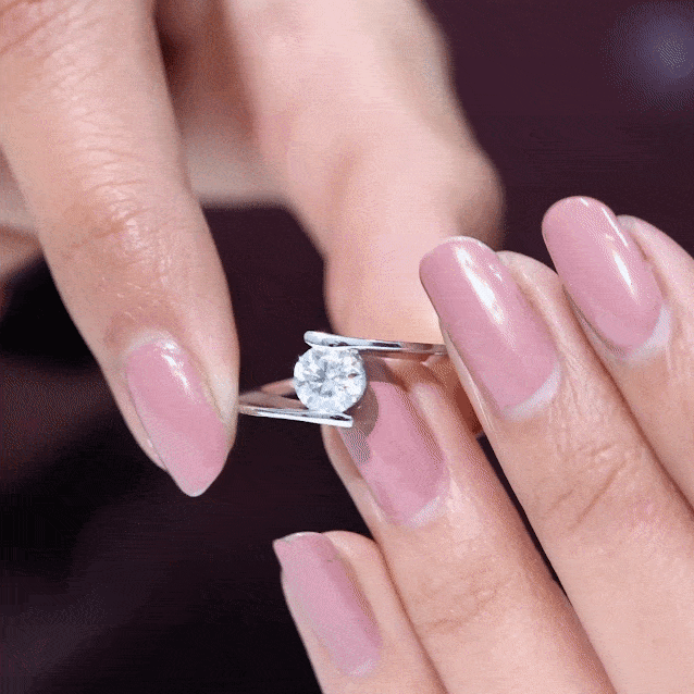 Yellow gold lab grown diamond tension setting engagement ring with a 6mm diamond from Rosec Jewels.