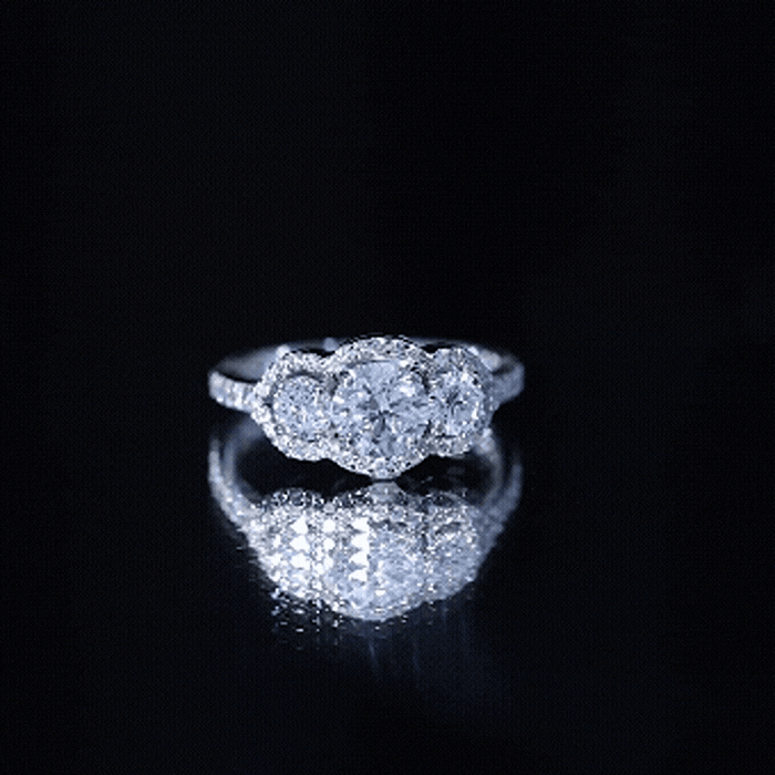 Yellow gold Rosec Jewels 3 stone lab-grown diamond engagement ring showcasing three sparkling diamonds on a polished band.