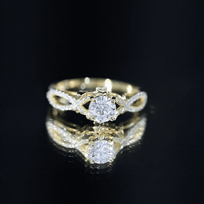 Yellow gold crossover engagement ring with a 0.9 carat lab-grown diamond, featuring a sleek and elegant design from Rosec Jewels.