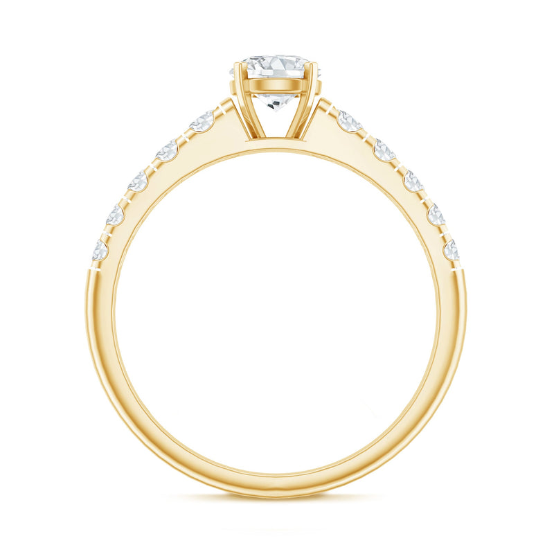 Lab grown diamond engagement ring with side stones, classic style, featuring a central diamond and detailed band design.