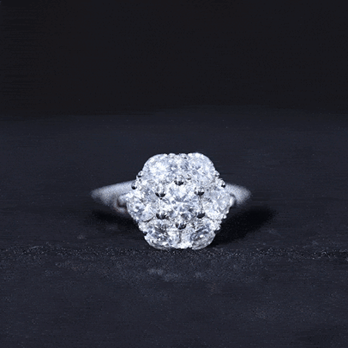 Yellow gold flower-shaped engagement ring with a certified lab-grown diamond from Rosec Jewels, featuring intricate petal detailing.