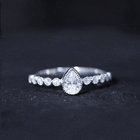 Lab Grown Diamond 5X7 MM Pear Shaped Engagement Ring With Side Stones