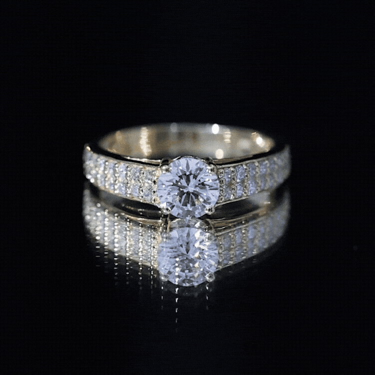 Certified 0.9 carat lab-grown diamond engagement ring with side stones, featuring a yellow gold band from Rosec Jewels.