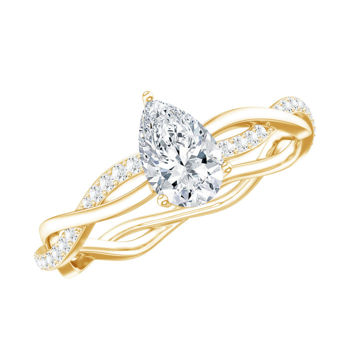 Pear-shaped lab-grown diamond engagement ring with a 5x7 mm center stone, set in a elegant ring from Rosec Jewels.