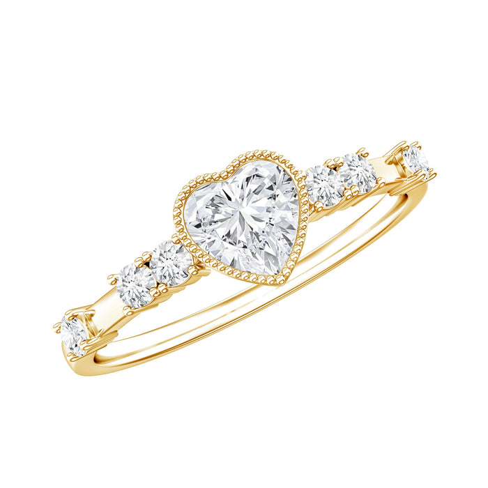 Lab grown diamond heart-shaped engagement ring with bezel setting from Rosec Jewels, featuring a sparkling central diamond.