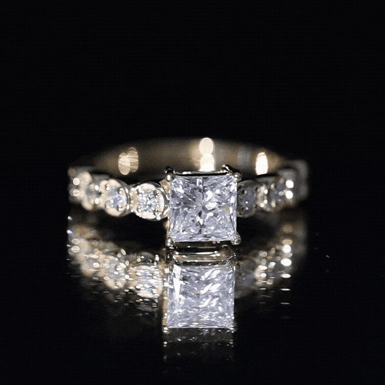 Yellow gold lab grown diamond 5mm princess cut engagement ring with side stones, featuring Rosec Jewels branding.