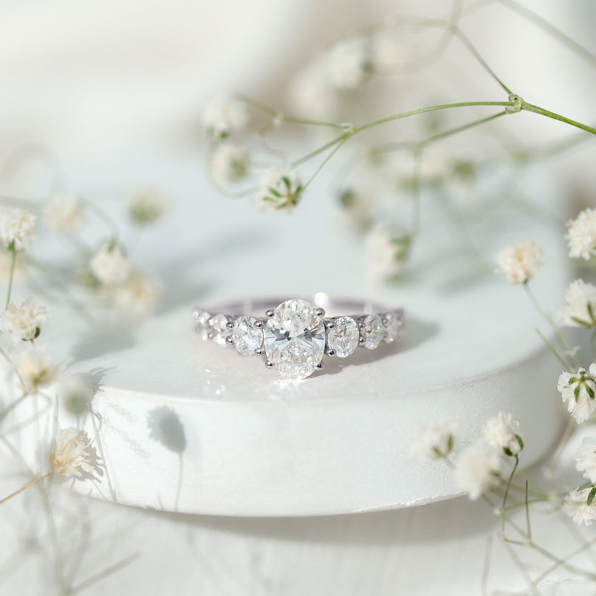 Lab Grown 1.2 Carat Diamond Oval Engagement Ring With Side Stones
