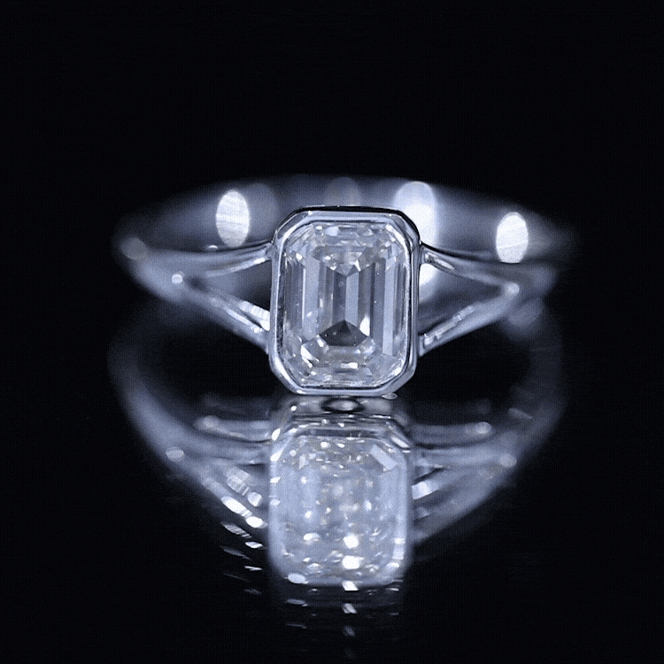 Certified 1.87 carat lab-grown diamond emerald cut engagement ring by Rosec Jewels, featuring a yellow gold band and sparkling center stone.
