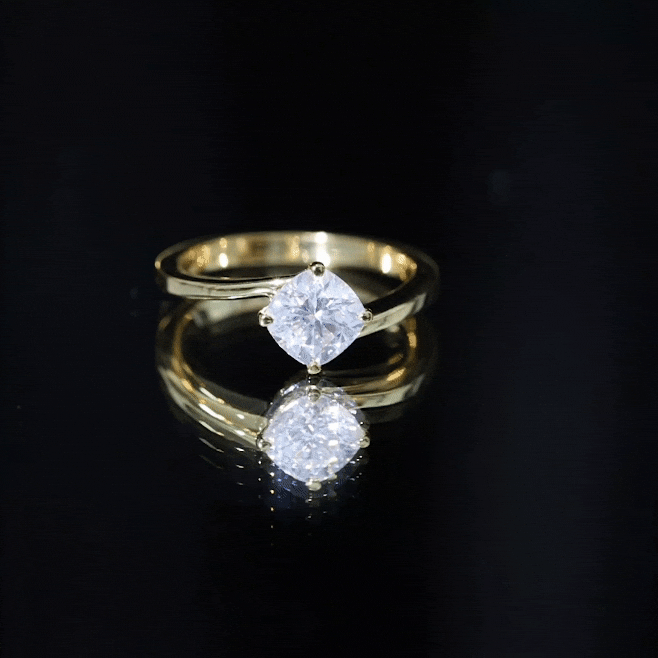 Yellow cushion-cut lab-grown diamond solitaire engagement ring by Rosec Jewels with a sleek band and brilliant sparkle.
