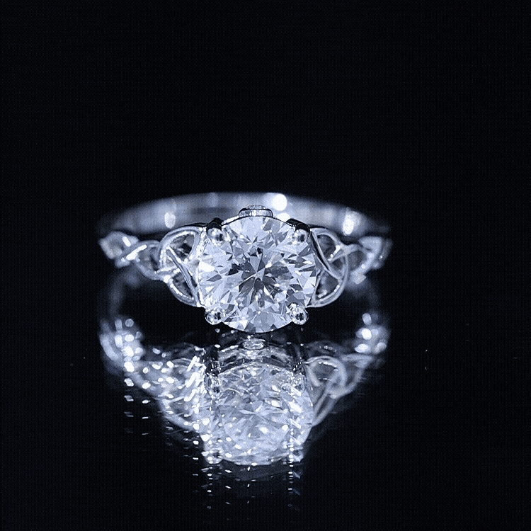 Certified 2 Carat round lab-grown diamond Celtic engagement ring by Rosec Jewels with intricate band design.