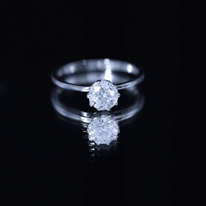 Yellow gold lab grown diamond 6mm round cut engagement ring from Rosec Jewels, featuring a sparkling central diamond and elegant band.