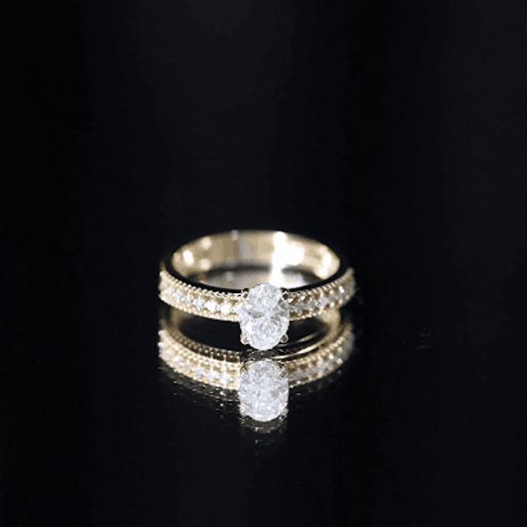 Oval lab-grown diamond engagement ring with vintage-inspired design in yellow gold from Rosec Jewels.