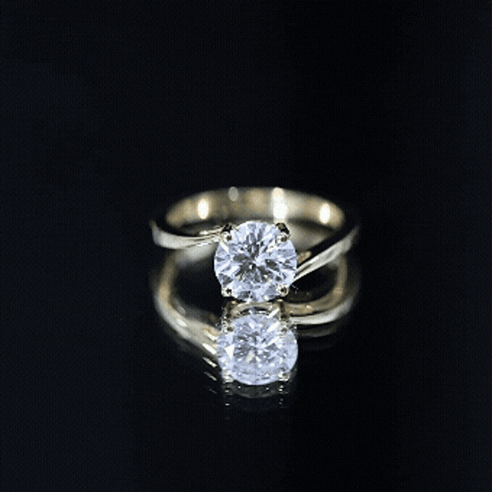 Yellow gold 1 carat lab-grown diamond bypass engagement ring by Rosec Jewels with sparkling center stone and elegant design.