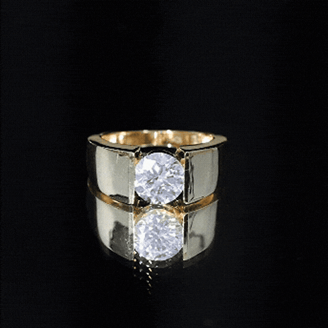 Yellow gold lab-grown diamond engagement ring inspired by Dua Lipa, featuring a 2 carat center stone and intricate design.