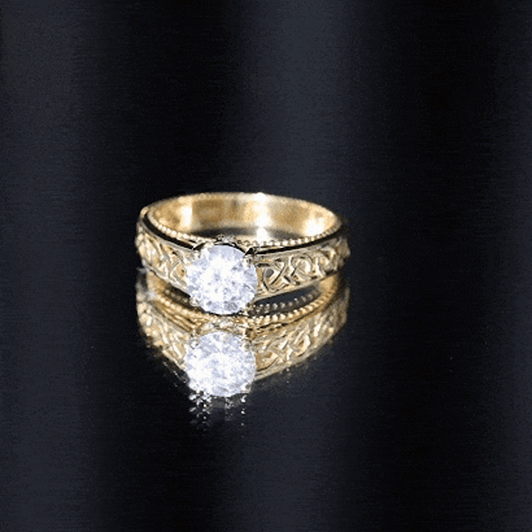 Yellow gold Celtic design engagement ring with a 7mm lab-grown diamond, crafted by Rosec Jewels.