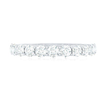 Rosec Jewels cubic zirconia half eternity ring for women with sparkling stones and a sleek band design.