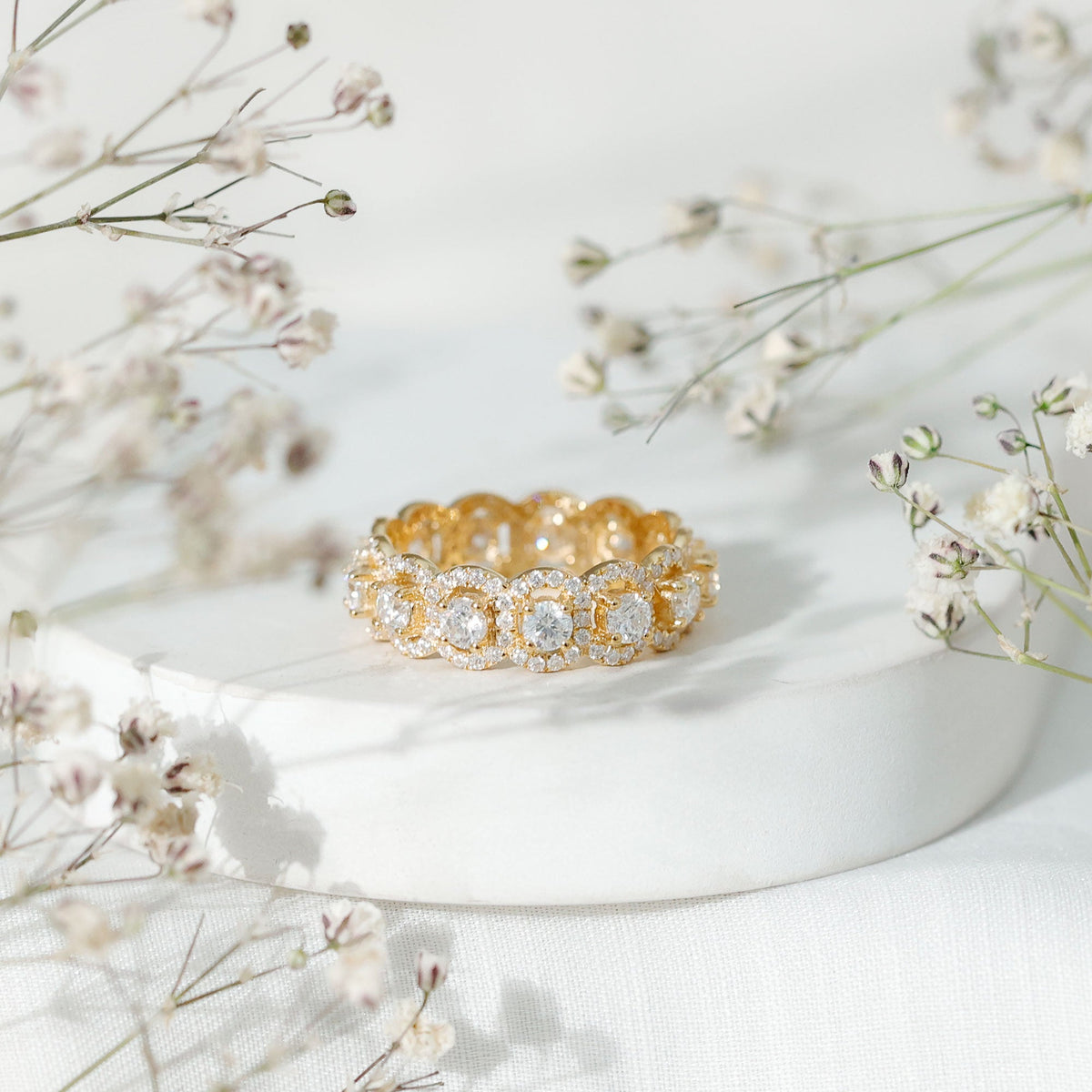 Rosec Jewels certified moissanite statement wedding band for women, featuring a sleek, elegant ring with sparkling gemstones.
