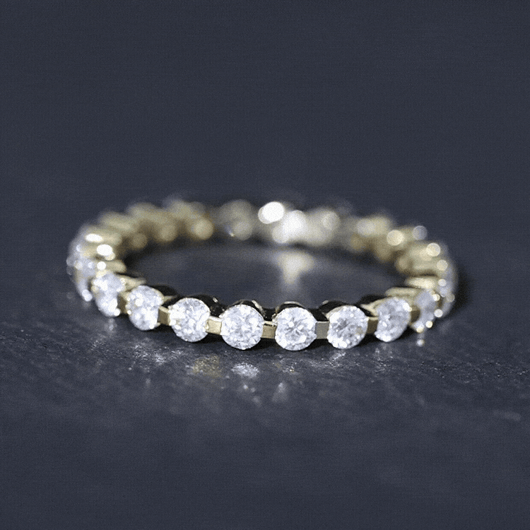Yellow gold Certified Round Cut Moissanite eternity band ring by Rosec Jewels, featuring sparkling round moissanite stones.