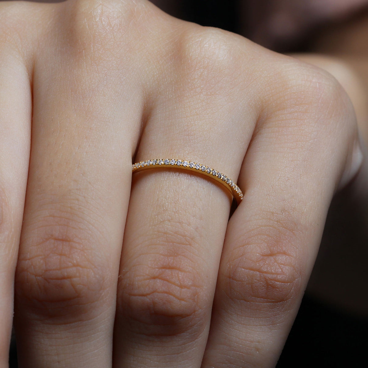 Stackable diamond eternity ring in fish tail setting by Rosec Jewels, featuring a row of sparkling diamonds on a sleek band.
