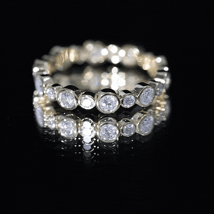 Yellow gold certified round cut moissanite eternity ring by Rosec Jewels, stackable design for women.