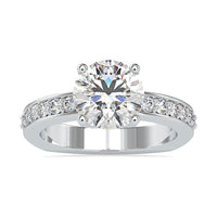 Rosec Jewels 2.50 CT solitaire zircon engagement ring with side stones, featuring a sleek metal band and sparkling central stone.