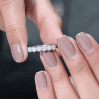 Minimalist Moissanite flower wedding band for women with delicate flower design, crafted by Rosec Jewels, in a sleek ring style.