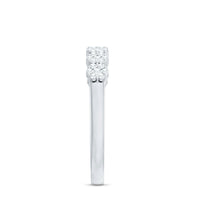 Minimalist Moissanite flower wedding band for women with delicate flower design, set in a sleek, elegant rose gold ring.