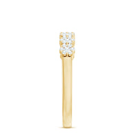 Minimalist Moissanite flower wedding band for women by Rosec Jewels, featuring delicate flower design and sparkling stones.