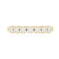 Minimalist Rosec Jewels moissanite flower wedding band for women featuring delicate flower design in sterling silver.