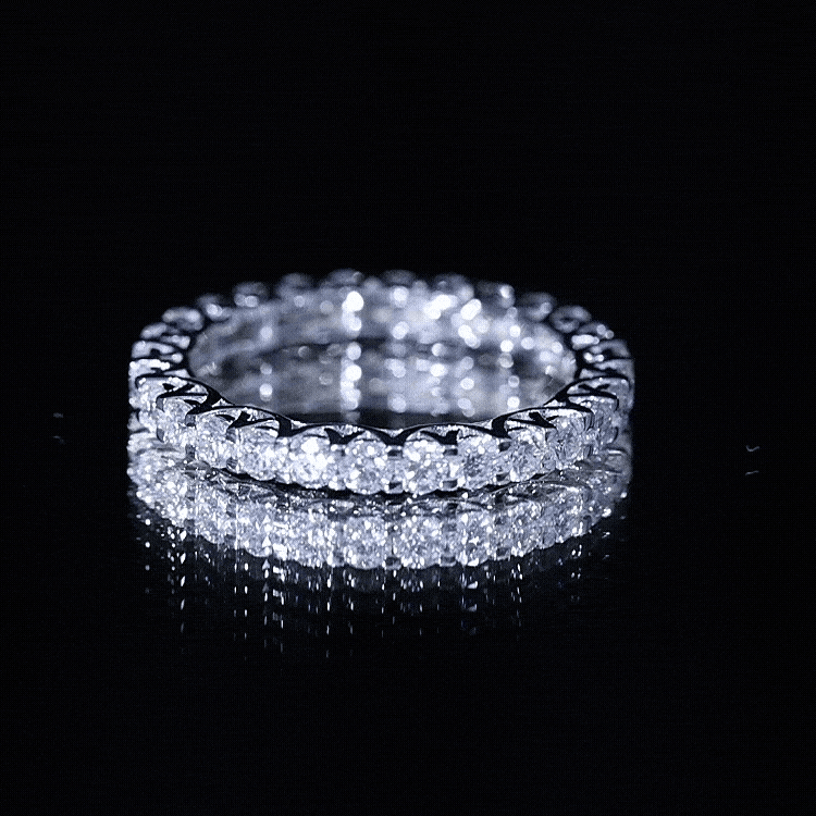 Yellow gold moissanite eternity wedding ring for women with brilliant cut stones, crafted by Rosec Jewels.