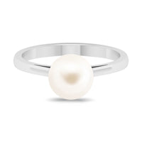 7.4 carat freshwater white pearl solitaire engagement ring with a silver band, showcasing a luminous pearl at the center.