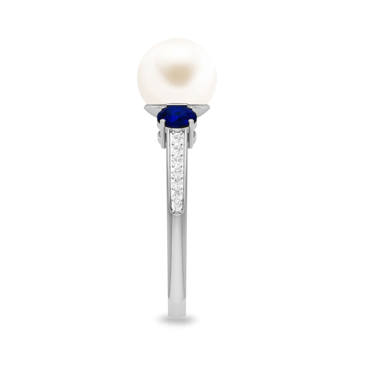 White pearl, sapphire, and diamond three-stone engagement ring by Rosec Jewels featuring elegant gemstone accents.