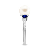 White pearl, sapphire, and diamond three-stone engagement ring by Rosec Jewels featuring elegant gemstone accents.