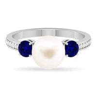 White pearl and sapphire 3-stone engagement ring with diamonds by Rosec Jewels, featuring a elegant design and sparkling gemstones.