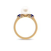 White pearl and sapphire 3-stone engagement ring with diamond accents from Rosec Jewels, showcasing the elegant ring design.