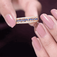 Marquise lab-created blue sapphire and diamond wedding band ring by Rosec Jewels, showcasing elegant gemstone and metal setting.