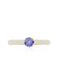 Natural Tanzanite engagement ring with pave diamond side stones from Rosec Jewels, featuring a stunning central gemstone and sparkling accents.
