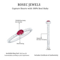 Pear-shaped ruby promise ring with diamond accents from Rosec Jewels, showcasing the elegant design and sparkling gemstones.