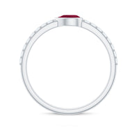 Pear-shaped ruby promise ring with diamond accents from Rosec Jewels, featuring a sleek East West style design.
