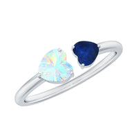 Natural heart-shaped Ethiopian Opal and blue sapphire promise ring featuring two stones, crafted by Rosec Jewels.