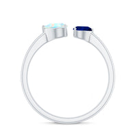 Heart-shaped Ethiopian opal and blue sapphire promise ring by Rosec Jewels, featuring two elegant gemstones on a silver band.
