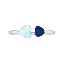 Natural heart-shaped Ethiopian Opal and blue sapphire promise ring with silver band, featuring two-stone design, by Rosec Jewels.