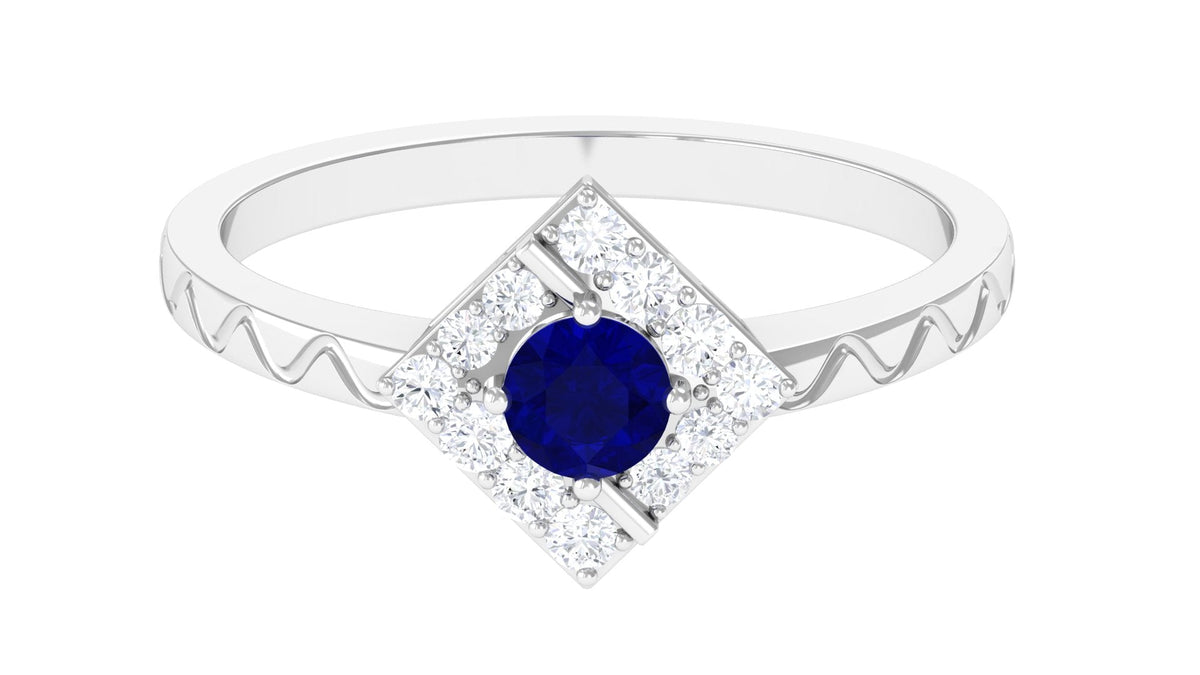 Rosec Jewels 3/4 CT blue sapphire and diamond ring with textured details, showcasing a delicate band and sparkling gemstones.