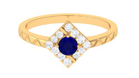 Rosec Jewels 3/4 CT blue sapphire and diamond ring with textured details, showcasing a elegant and intricate design in sterling silver.
